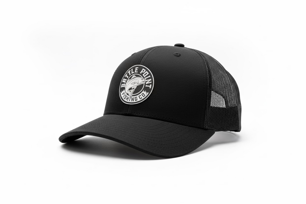 Black cap with a redfish logo on a white background